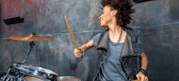 Woman playing drums