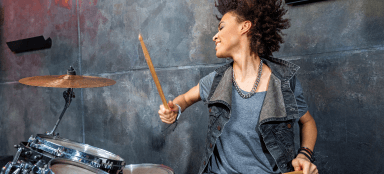 Woman playing drums